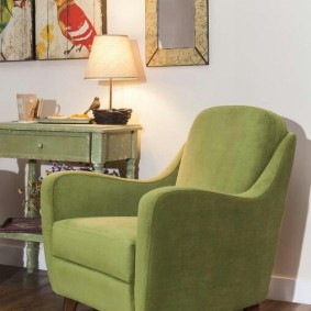 Fauteuil rembourré vert