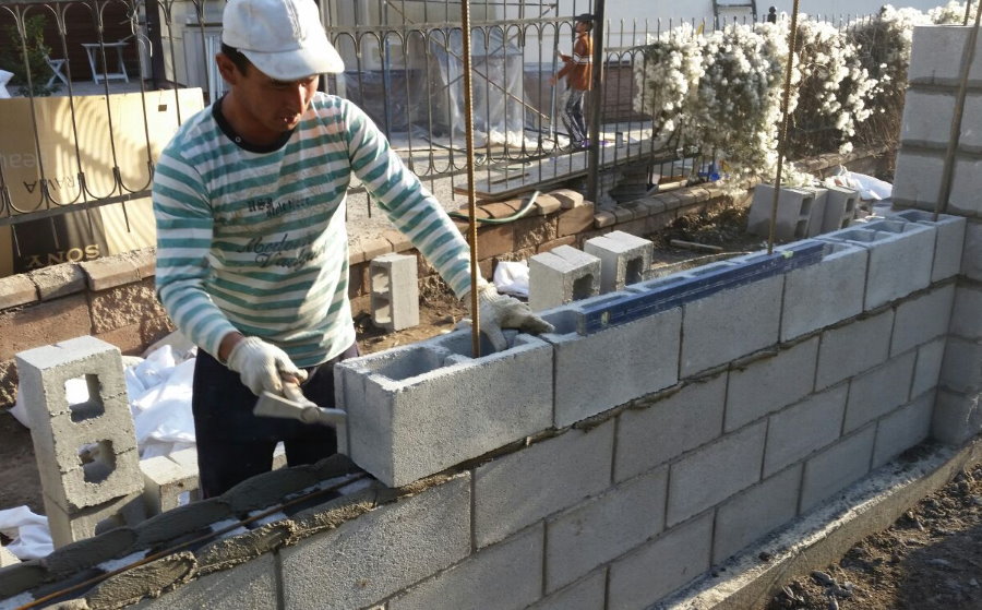 Masonry section of concrete block fence