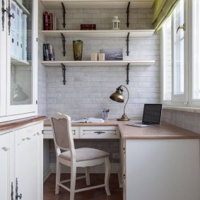 Schoolchild's desk on a glazed balcony