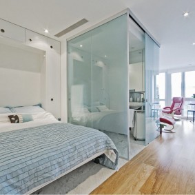 Glass partitions in a studio apartment