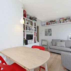 Red chairs at the kitchen table