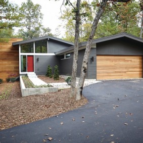 Wooden gates in the frame garage