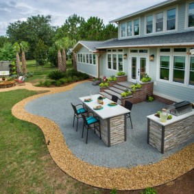 Arrangement of summer kitchen in the open air