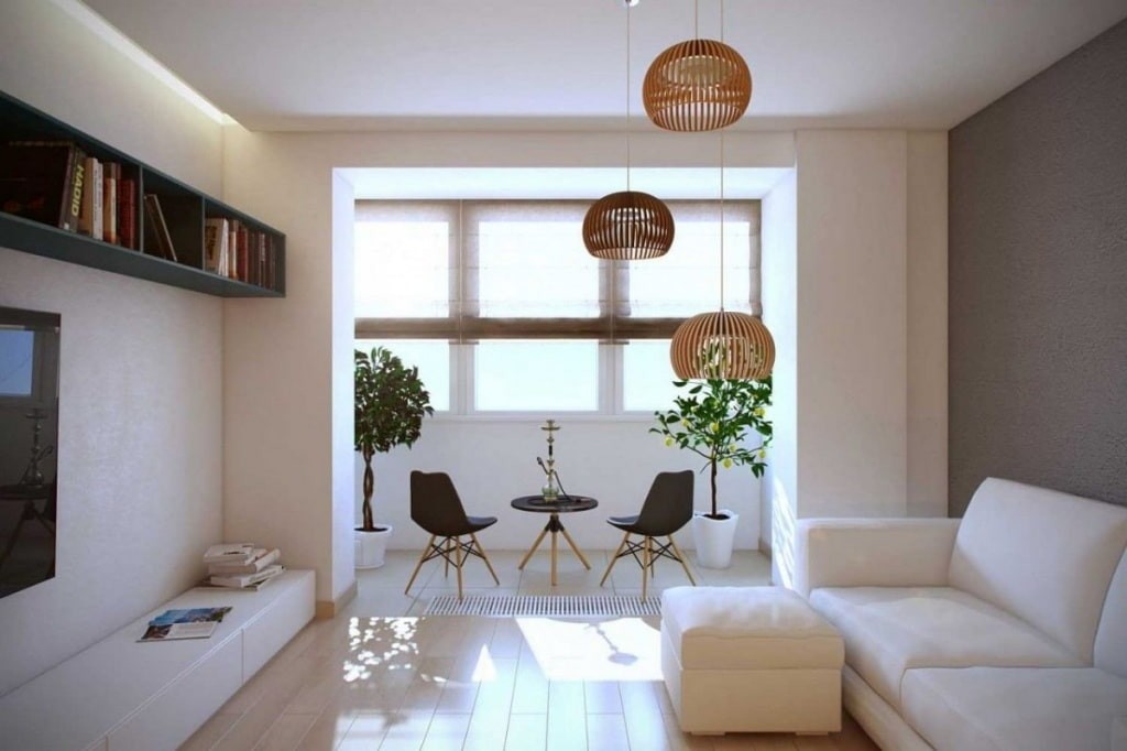 White sofa in the living room with attached loggia