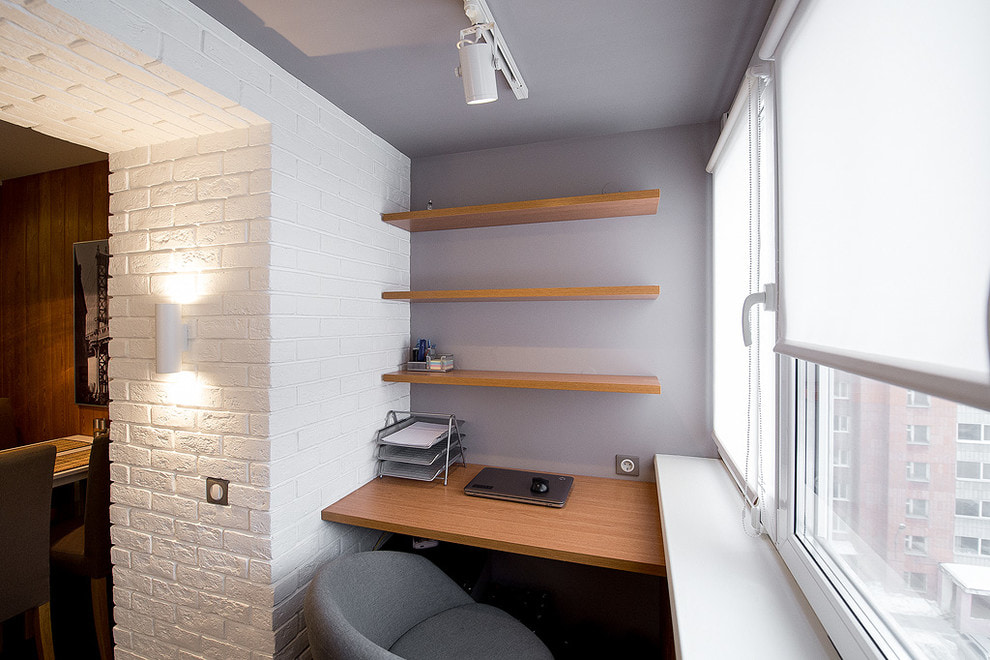 Wooden shelves on the wall of a comfortable balcony